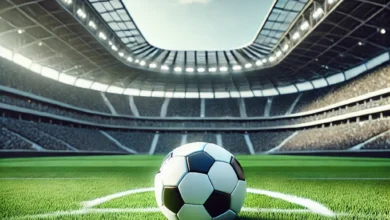 Bola de futebol em um estádio.