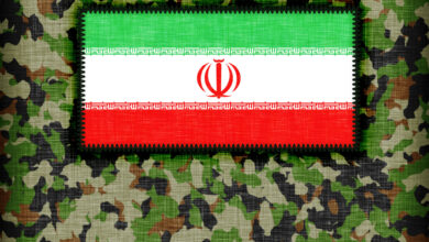 Bandeira no uniforme iraniano.