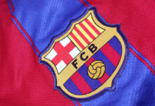 Barcelona Football Club on an official jersey. FC Barcelona were founded in 1899. —