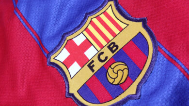 Barcelona Football Club on an official jersey. FC Barcelona were founded in 1899. —